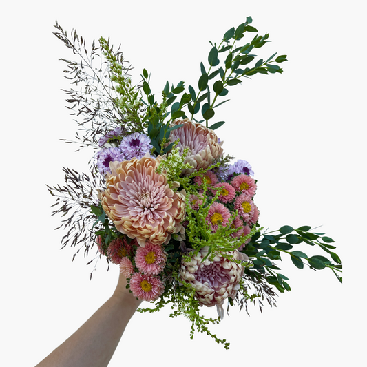 Flower bouquet with pink, purple and green flowers
